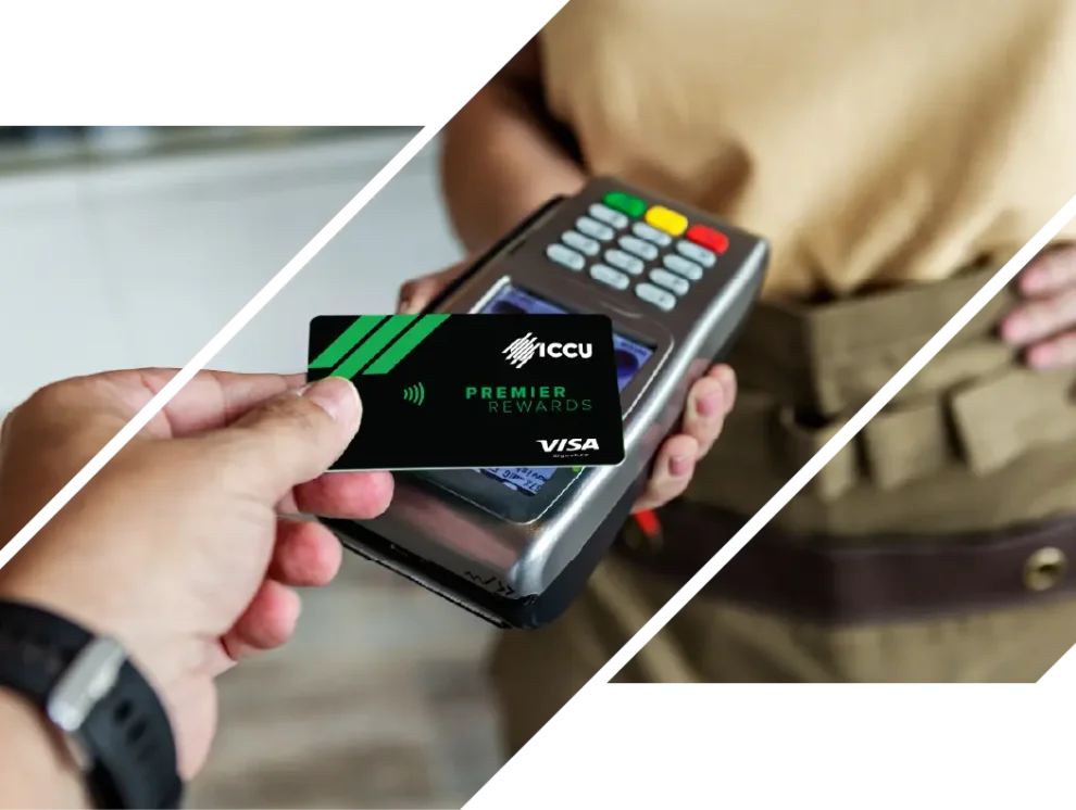 A person prepares to make a contactless payment using an ICCU Premier Rewards Visa card at a payment terminal.