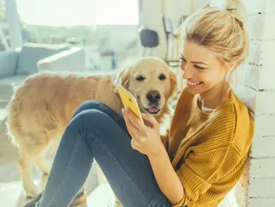 Women on her phone smiling