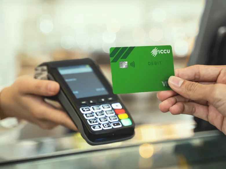 Person paying with their debit card